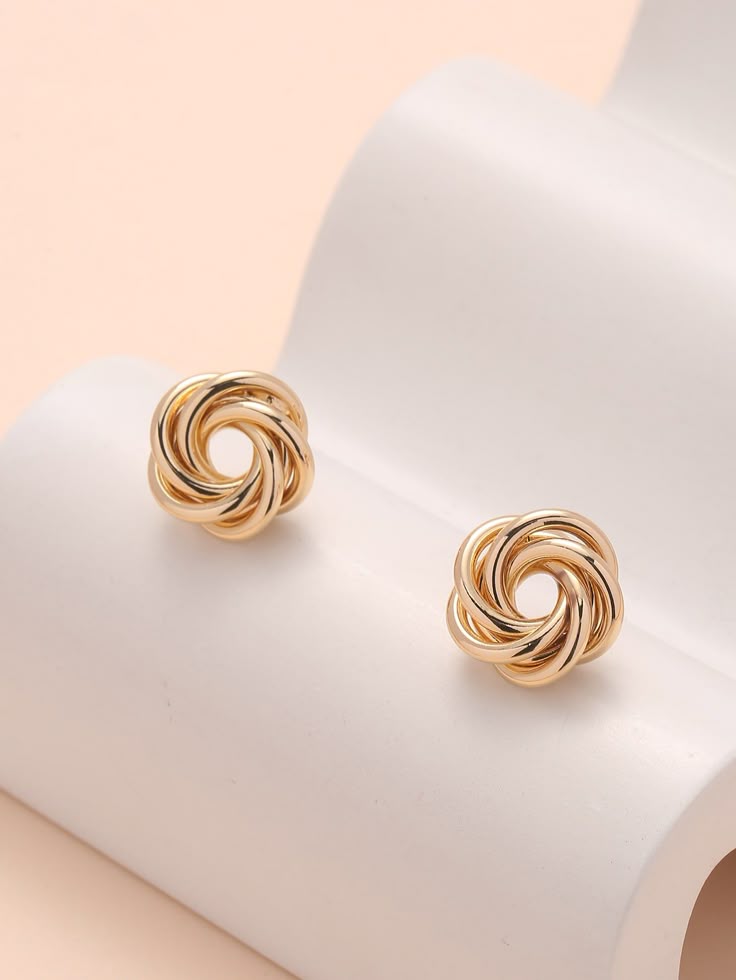 Twisted Knot Gold Toned Stud Earrings - Image 2